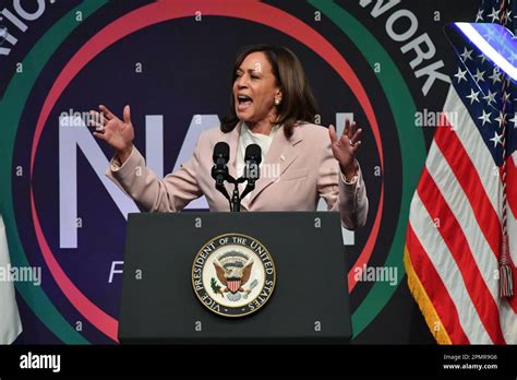 Kamala Harris speaking at a conference